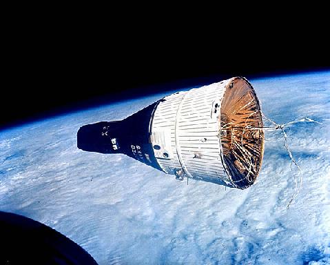 Gemini 7 capsule in orbit; photo by NASA, public domain